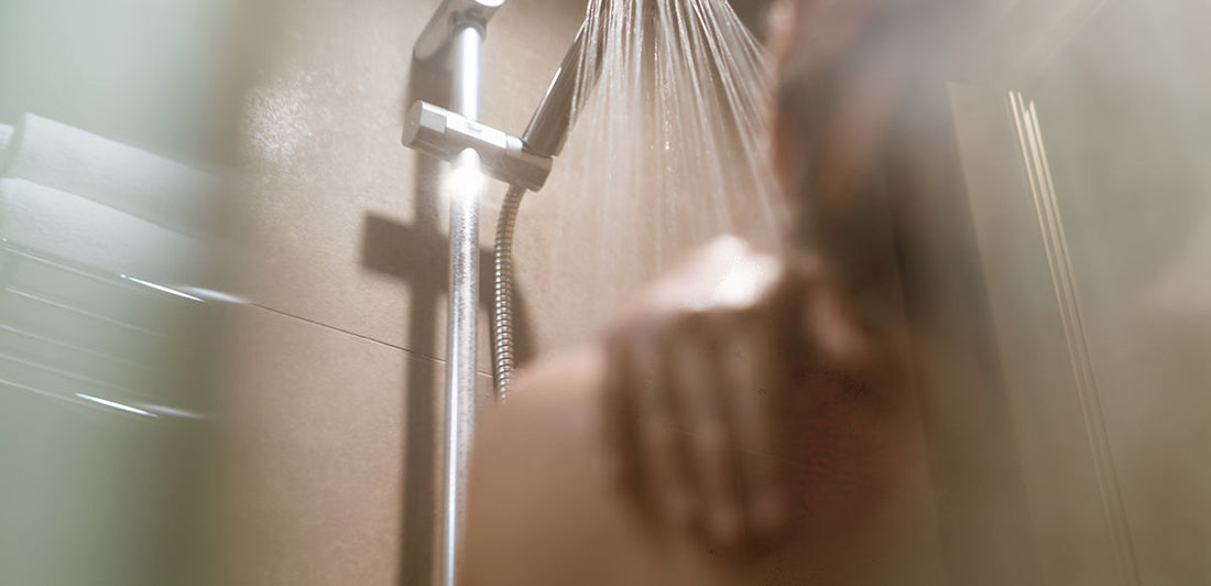 Person with rash in shower