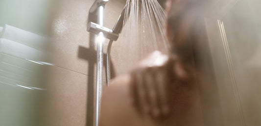 Person with rash in shower