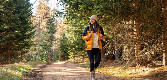 Woman walking on nature trail